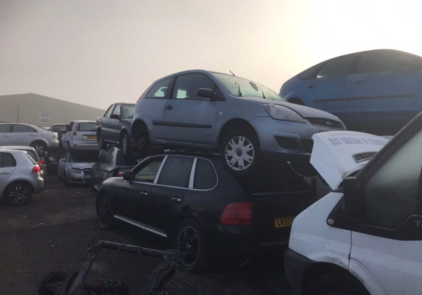 A bunch of cars that are stacked on top of each other